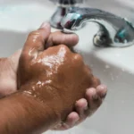 Washes hands saving water
