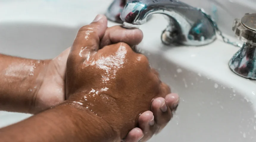 Washes hands saving water